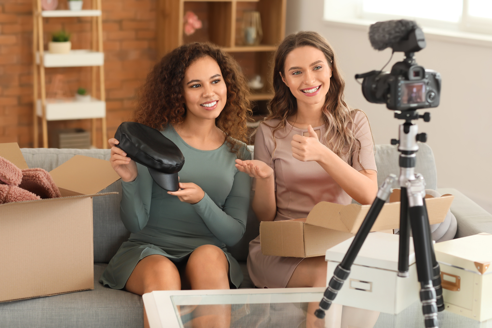 Female Vloggers Making an Unboxing Video